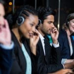 Image of a team of call center outsourcing professionals