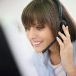 Image of a live virtual receptionist taking calls for a business