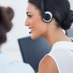 Image of agents taking calls at a HIPAA compliant answering service