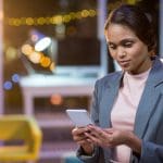 Image of a businesswoman that uses an after-hours phone service