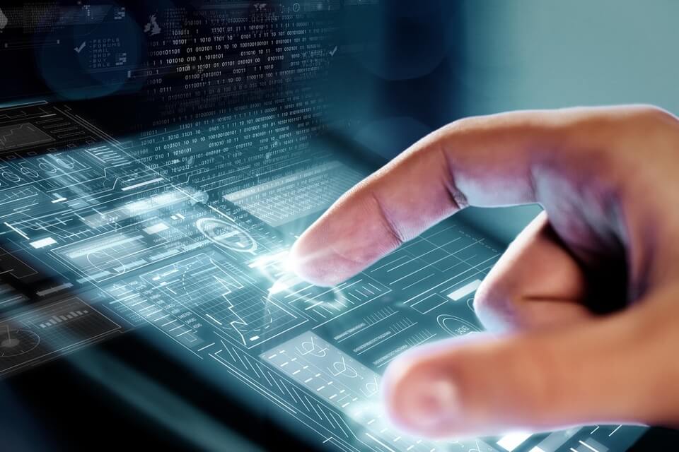 Image of a hand using Signius technology solutions on a tablet