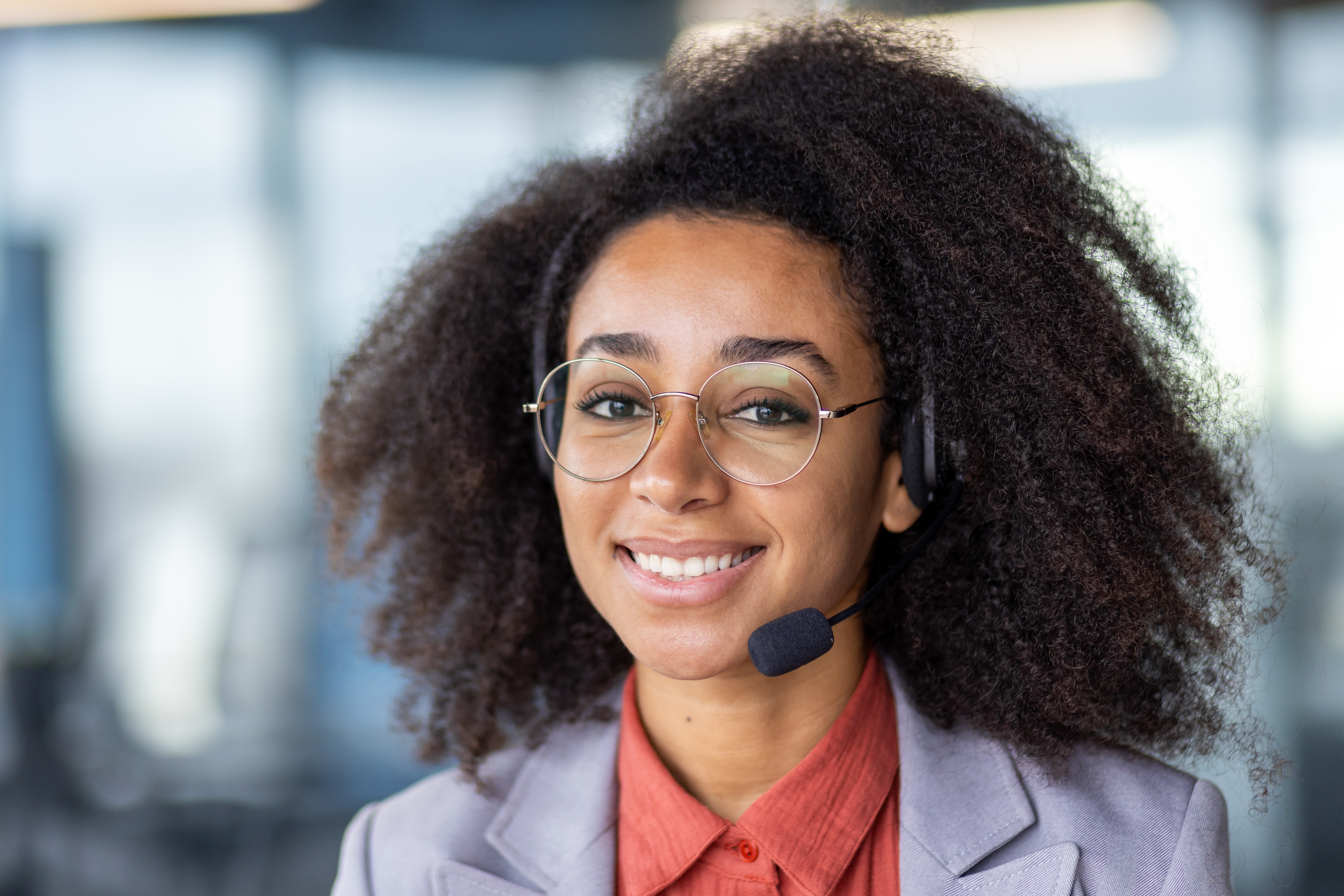 Smiling Customer Service Representative In Office Setting